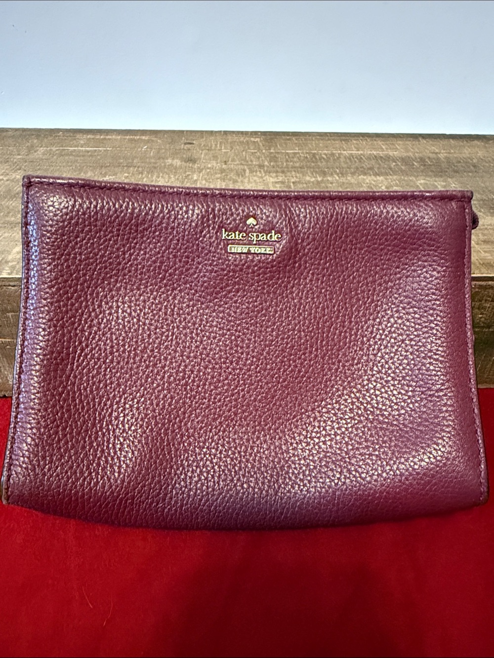 Kate Spade Plum Pebbled Leather Clutch with Gold Logo